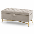 Banquette de rangement en velours beige avec pieds en métal